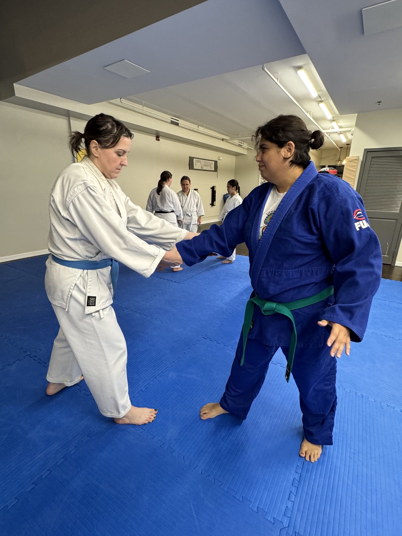 Two students drilling a technique in Japanese Ju-Jitsu